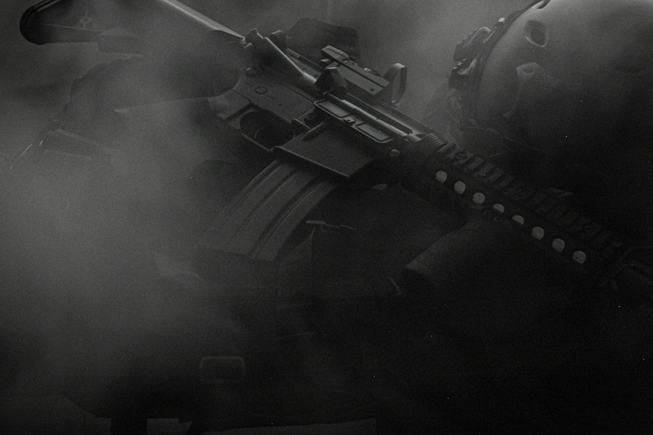 black assault rifle on black textile