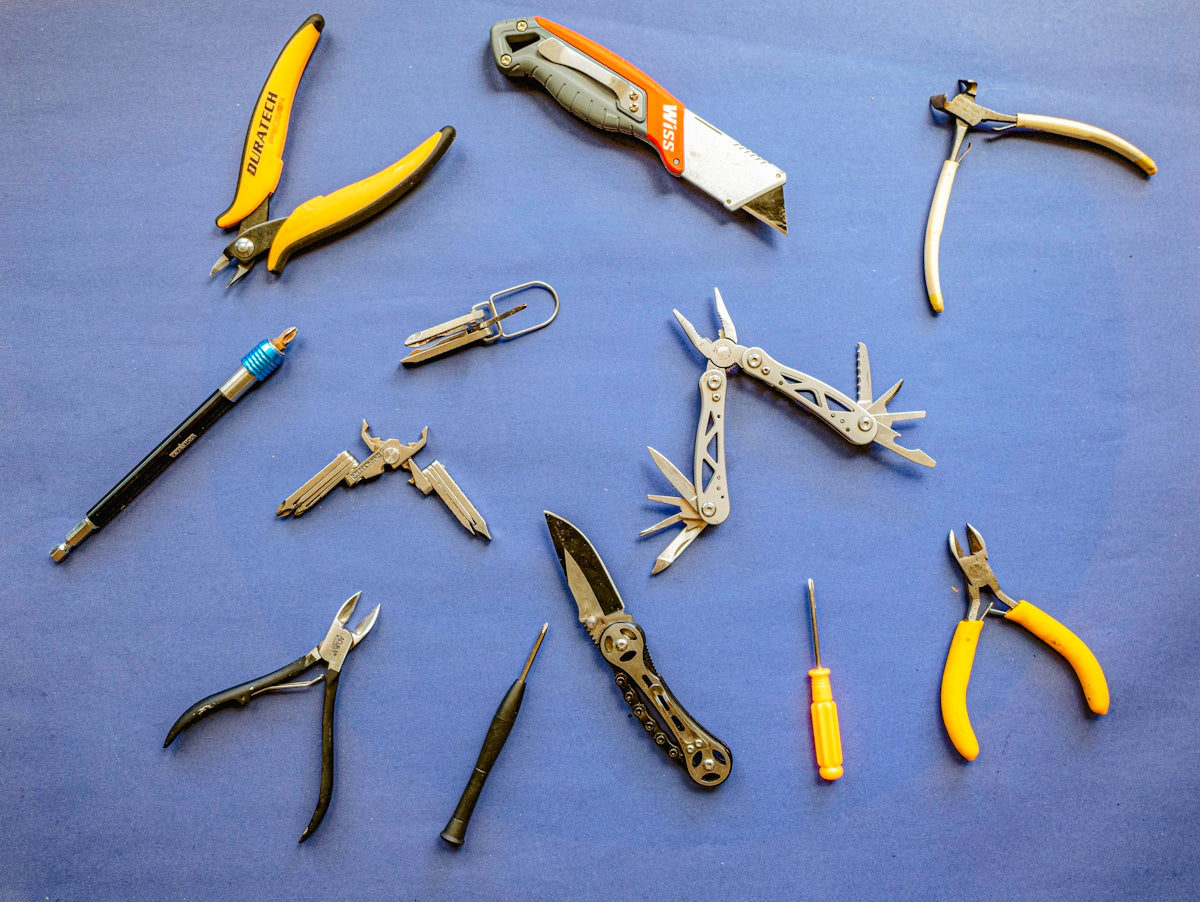 a bunch of tools that are laying on a table