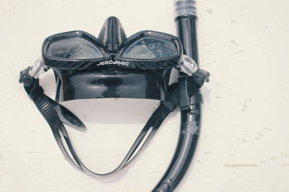 a pair of diving goggles attached to a diving device