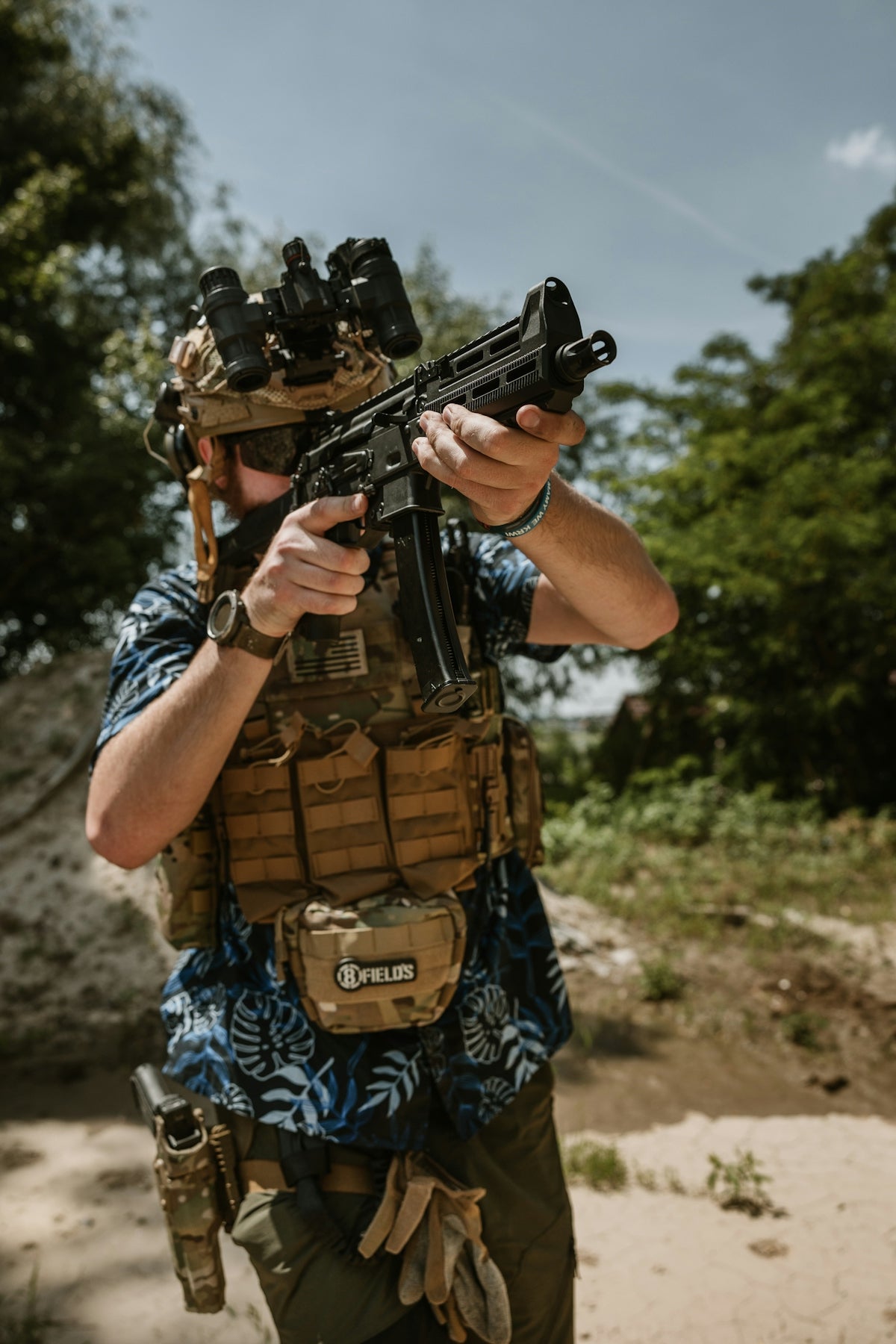 A man with a gun in his hand